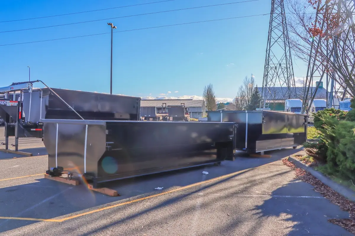 Roll-off dumpster ready for waste disposal at job site for Roll Off Dumpster Rental in Somerville